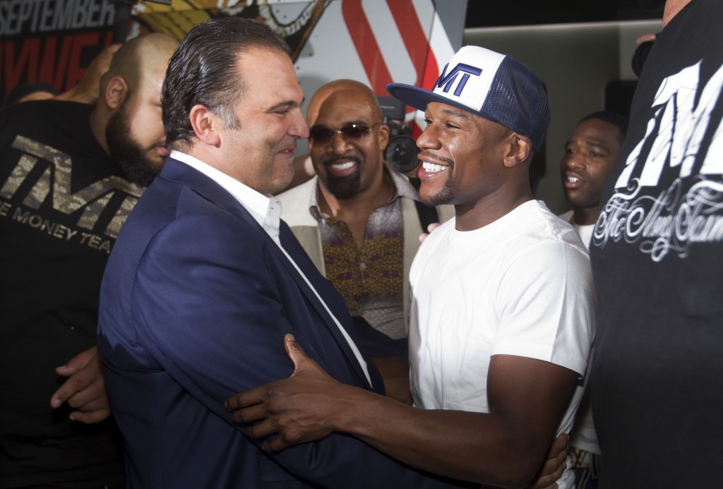 Richard Schaefer greets Floyd Mayweather Jr. of the U.S. at the MGM Grand Hotel and Casino in Las Vegas